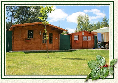 2 maisons en bois au jardin